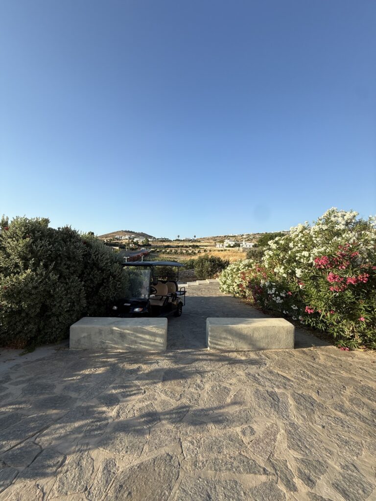 Buggy parked beside the garden at Paros Agnanti Resort