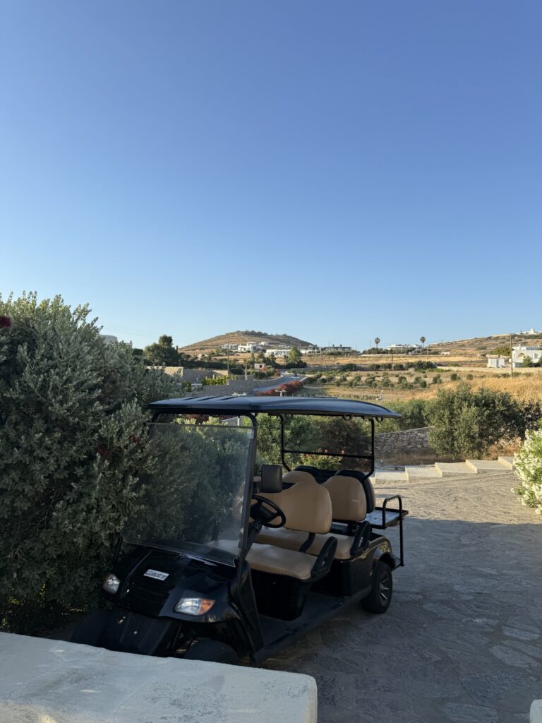 Guest transport buggy among the gardens at Paros Agnanti Resort
