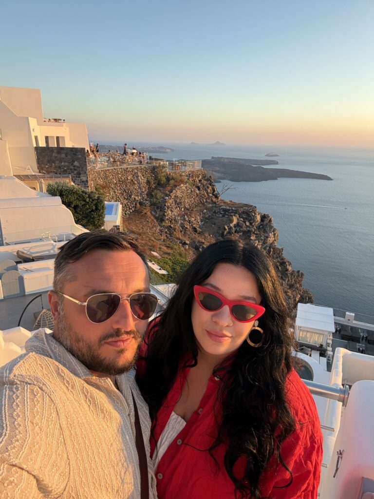 Couple at sunset in Imerovigli Santorini