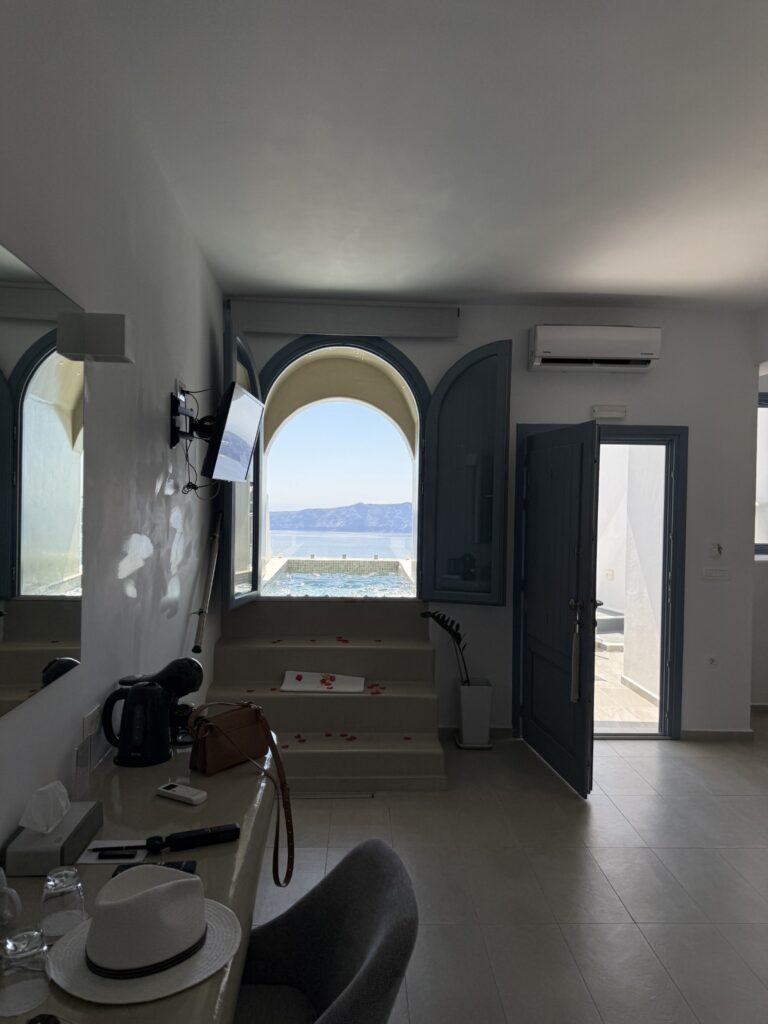 Pegasus Suites interior and caldera pool view