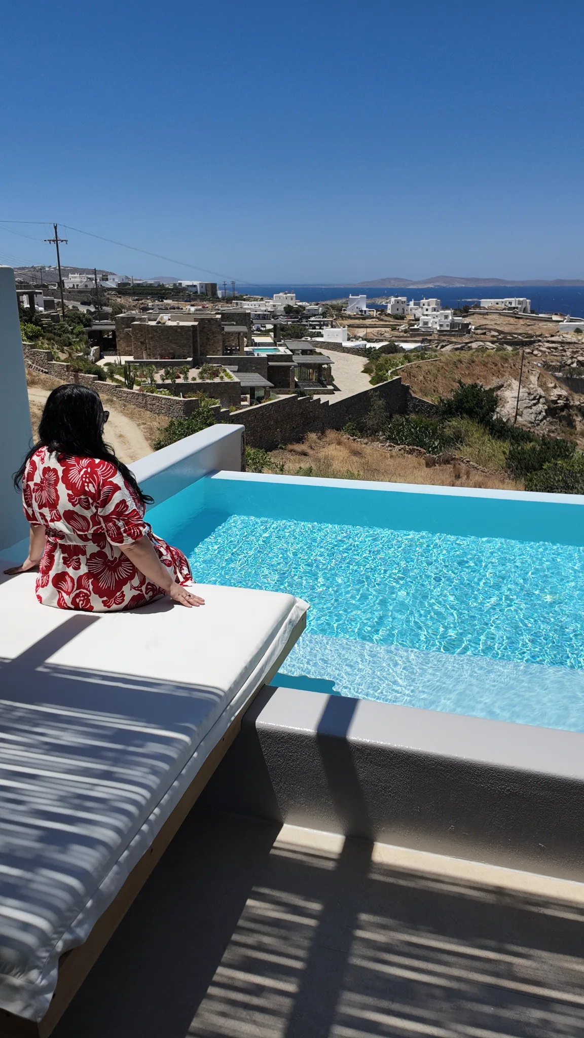 Private pool at Nomia Sunset Suites in Mykonos overlooking the Aegean Sea and Cycladic landscape